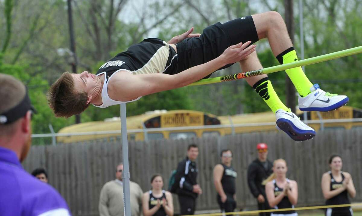 Jared Lorimier, from Nederland High School, clears one of his attempts with the bar set at 6 feet, 8 inches in the high jump event. Babe Zaharias Stadium in Beaumont was the site for the District 20-4A track and field meet Monday April 8, 2013. Dave Ryan/The Enterprise