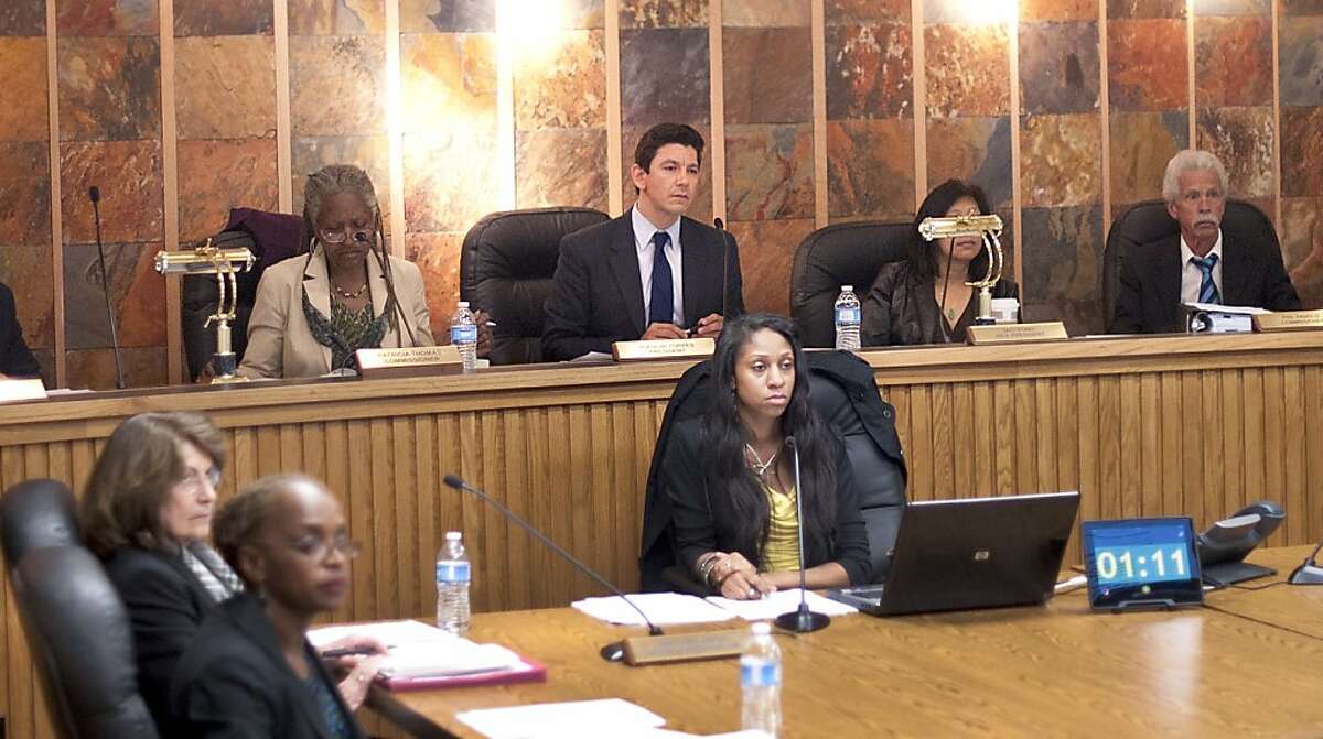 Joaquin Torres, center, presides over a San Francisco Housing Authority Commission meeting on Monday, April 9, 2013, in San Francisco. The Board voted to terminate the contract of executive director Henry Alvarez.