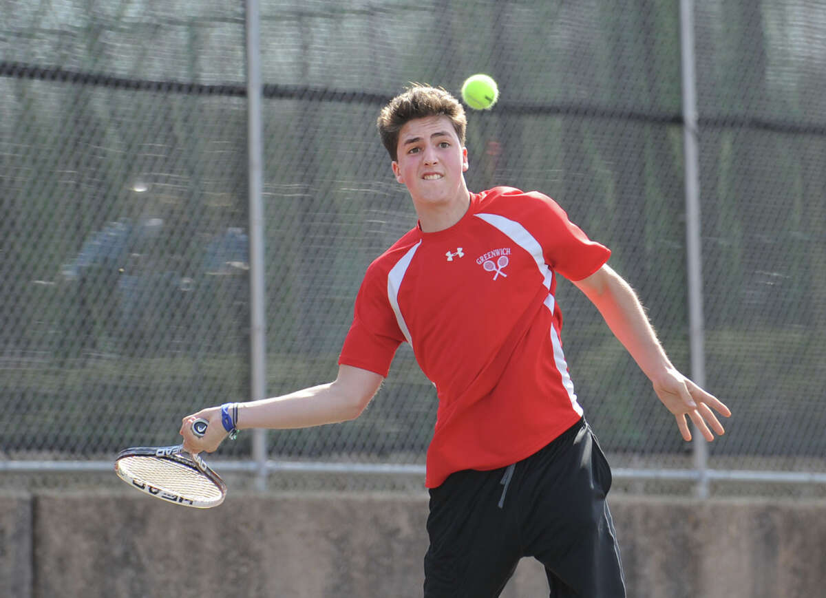 Zach Niklaus of Greenwich during his match against New Canaan's Tommy Worcester in the boys high school tennis match between Greenwich High School and New Canaan High School at Greenwich, Tuesday, April 9, 2013. Niklaus defeated Worcester and Greenwich won the match, 7-0.