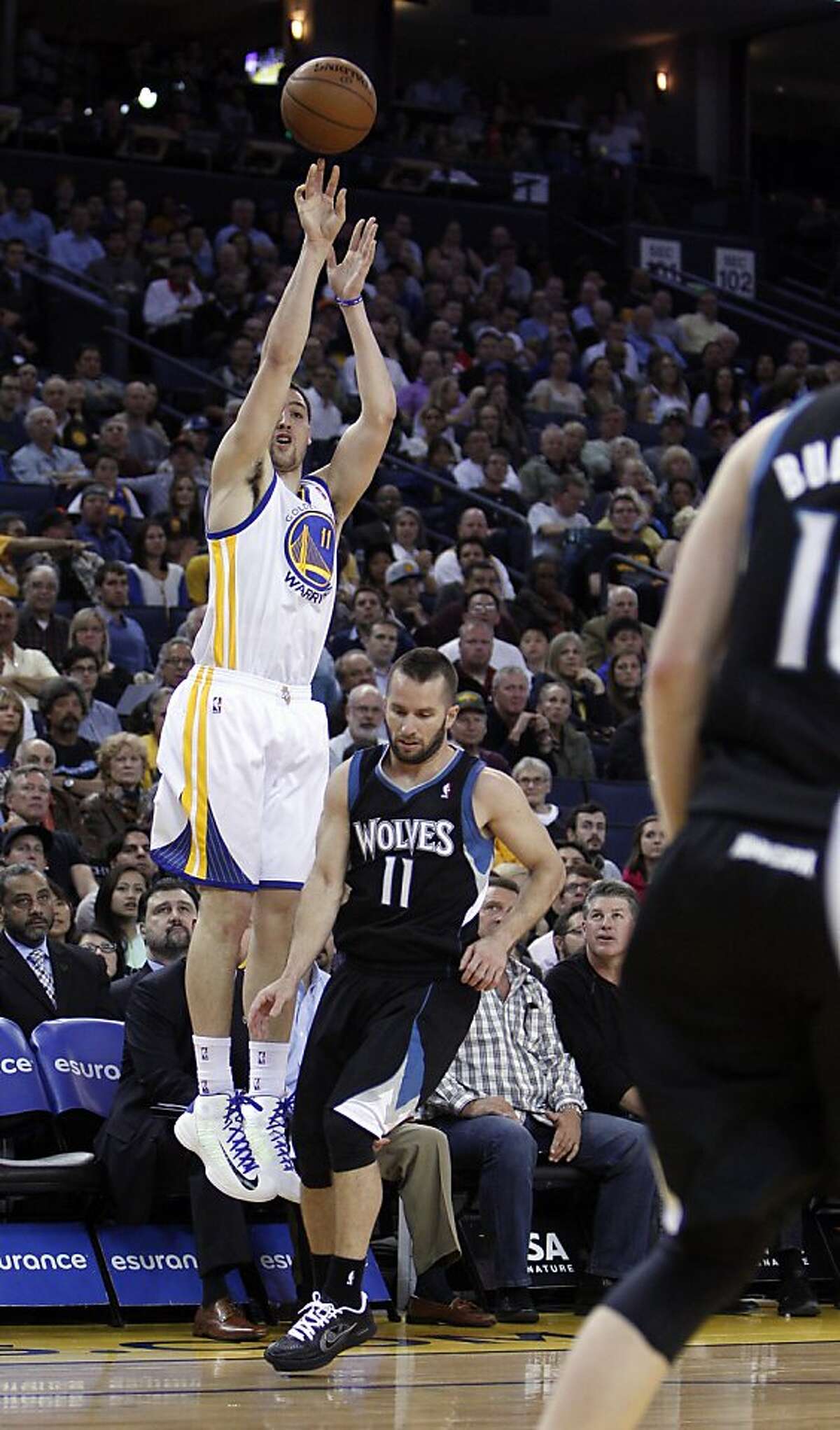 Warriors Beat T'wolves, Clinch Playoffs