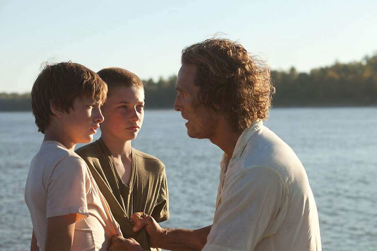 Tye Sheridan, Jacob Lofland and Matthew McConnaughey in "Mud," about a fugitive who is added by two young teens.