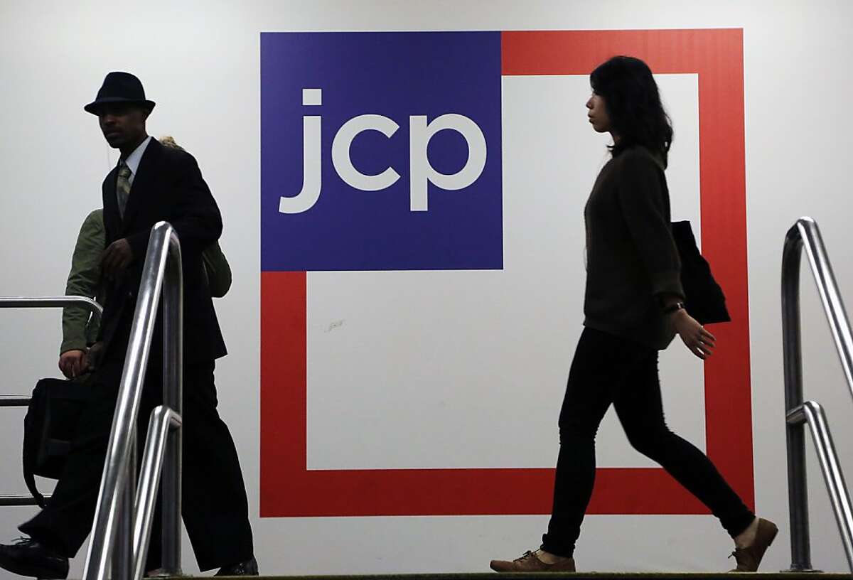 Customers arrive at a J.C. Penney store, Tuesday, April 9, 2013 in New York. J.C. Penney is hoping its former CEO can revive the retailer after a risky turnaround strategy backfired and led to massive losses and steep sales declines. The company's board of directors ousted CEO Ron Johnson after only 17 months on the job. The department store chain said that it has rehired Johnson's predecessor, Mike Ullman. (AP Photo/Mark Lennihan)