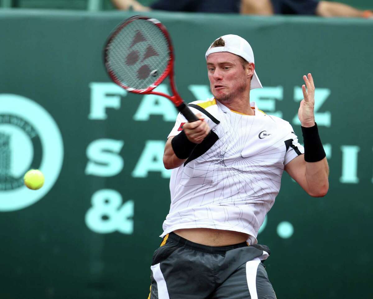 Lleyton Hewitt plays against Martin Alund during the first round of the US Men's Clay Court Championships, Wednesday, April 10, 2013, in Houston.