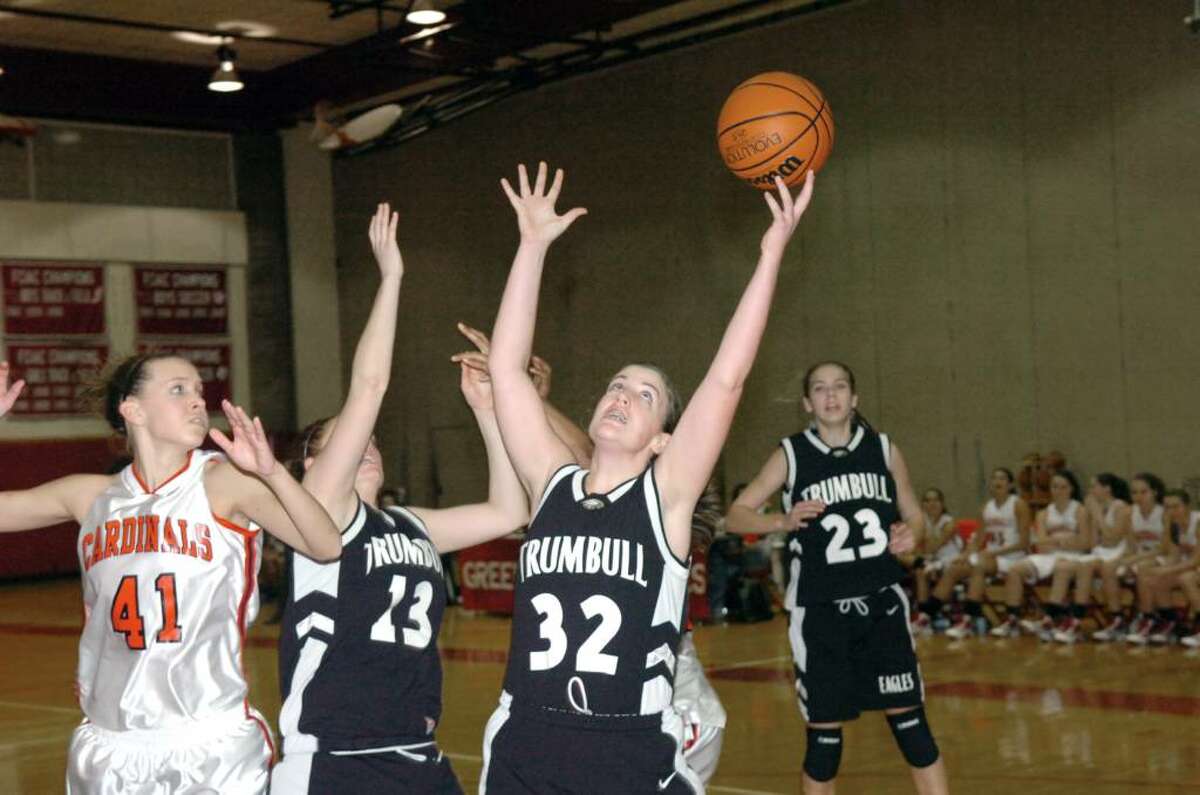 Trumbull's Erin Moore wins the rebound as Greenwich High School hosts Trumbull in a girls basketball game Tuesday evening, January 5, 2010. Trumbull won the game, 51-30.