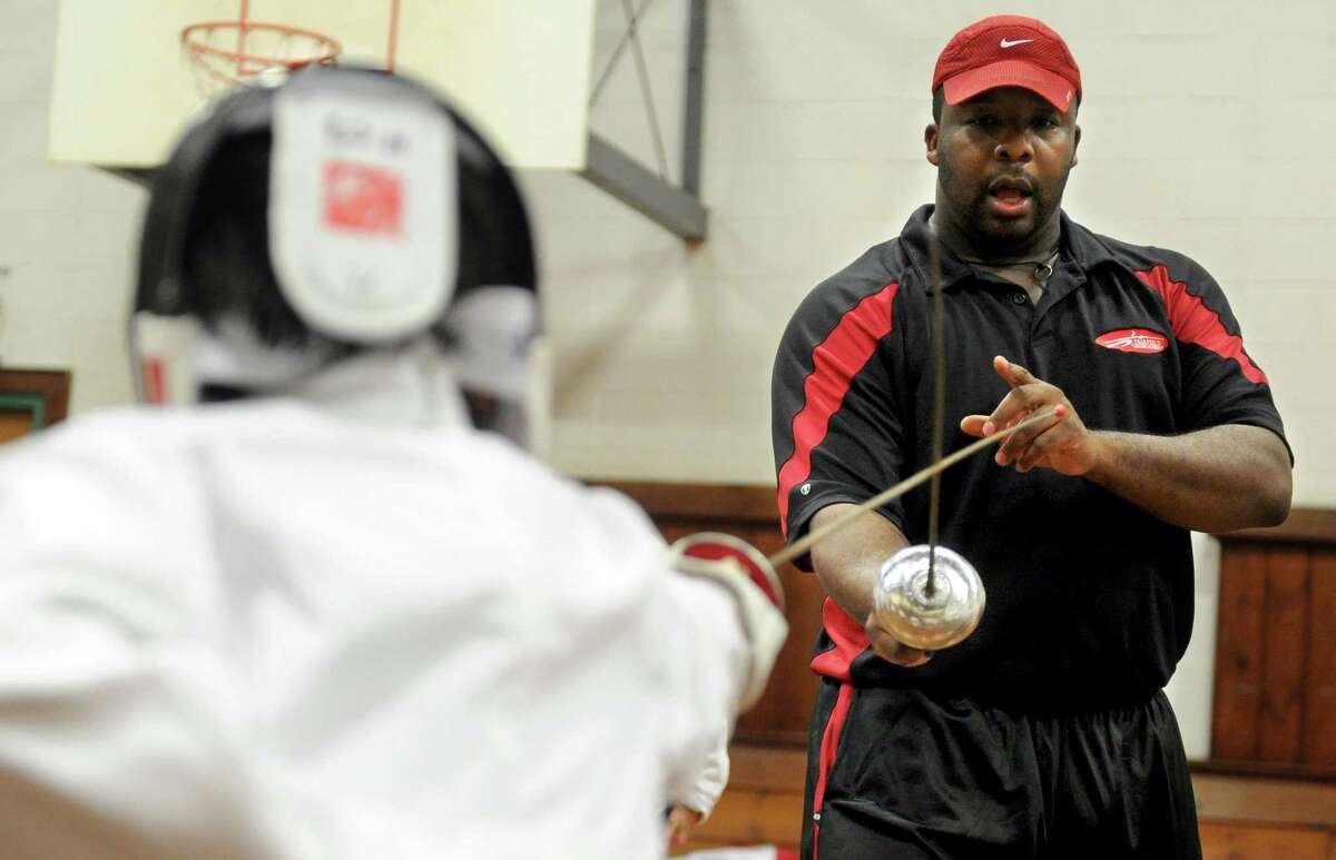 John Tejada teaches fencing at the Wakeman Boys and Girls Club in Southport on Wednesday, May 18, 2011. Tejada, 36, of Cheshire, the former coach of the fencing team at Fairfield Warde and Fairfield Ludlowe high schools has been charged with sexually assaulting a local student.