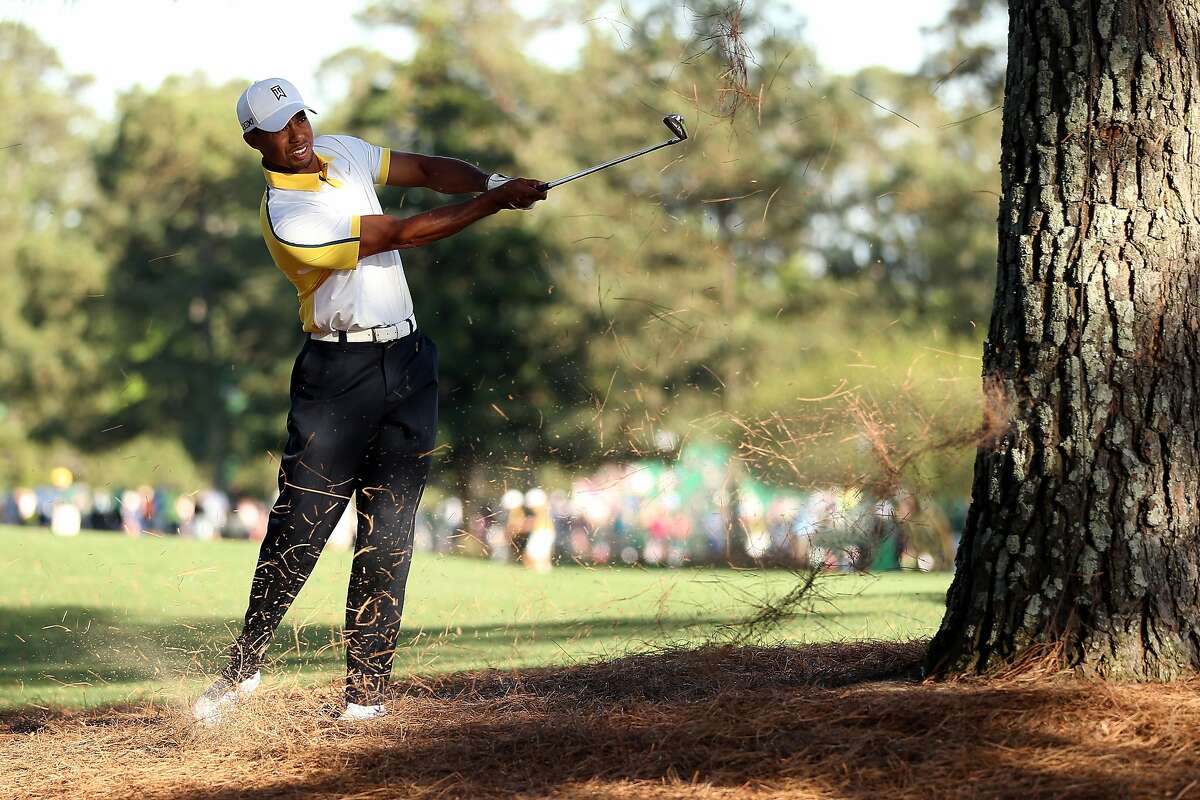 AUGUSTA, GA - APRIL 12: Tiger Woods of the United States hits a shot on the 15th hole during the second round of the 2013 Masters Tournament at Augusta National Golf Club on April 12, 2013 in Augusta, Georgia. (Photo by Andrew Redington/Getty Images)