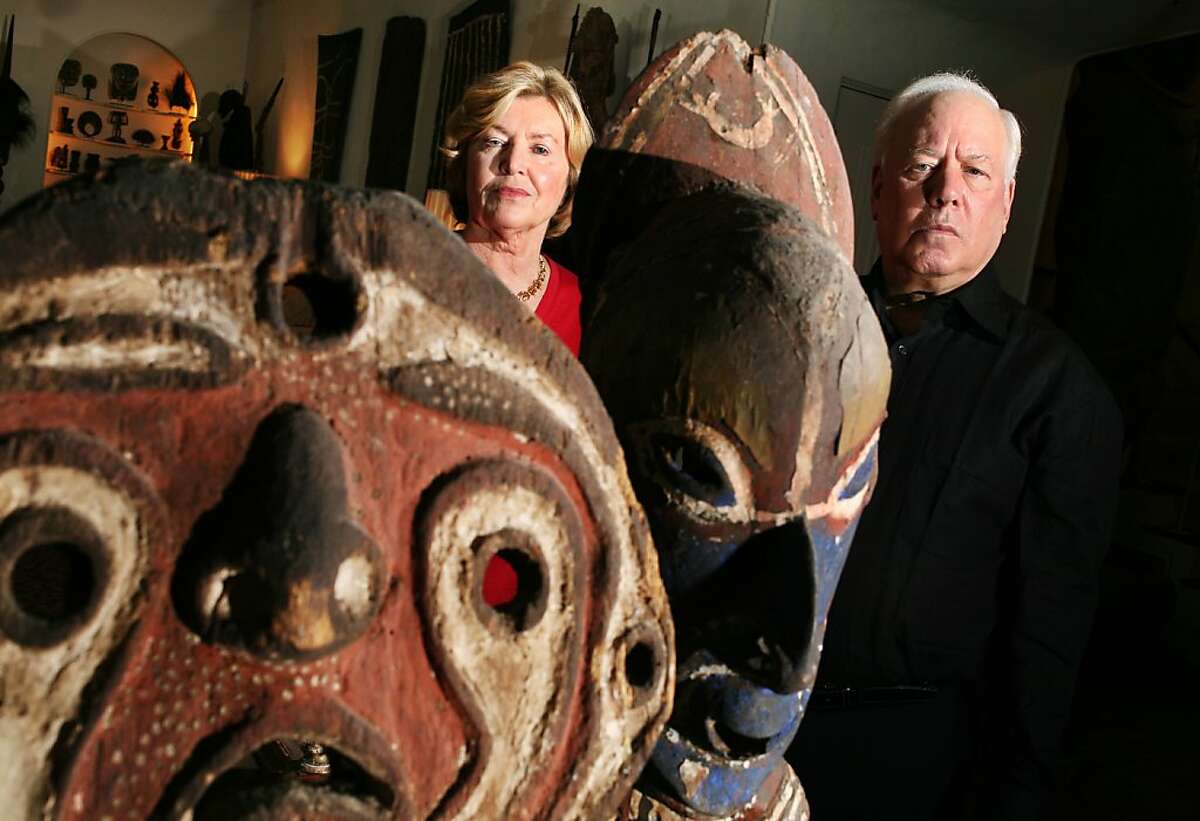 Rye, NY_Nov. 12, 2008_John and Marcia Friede pose in their living room with tribal figures from their 4,000 piece collection of art from Papua New Guinea. The Friedes are embroiled in a lawsuit with two of Mr. Friede's brothers over their mother's estate. The suit may endanger the collection, most of which has been promised to the Fine Arts Museums of San Francisco.