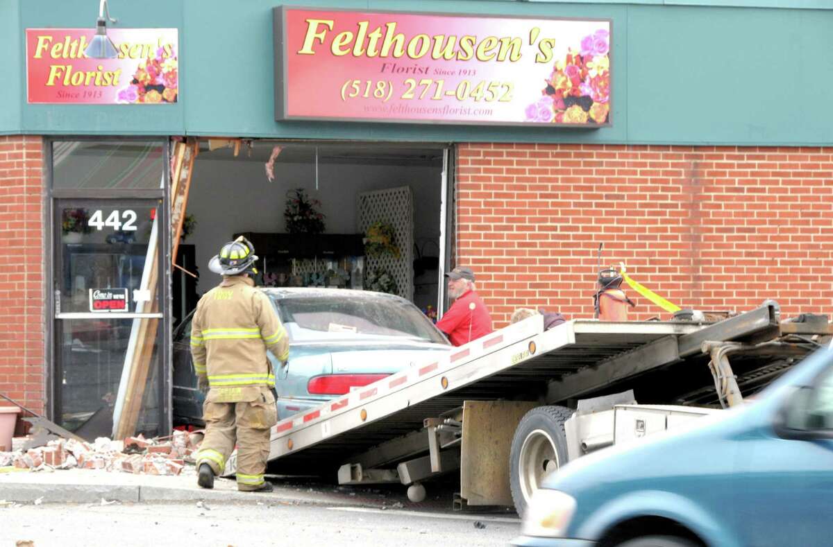 Troy driver crashes into flower store