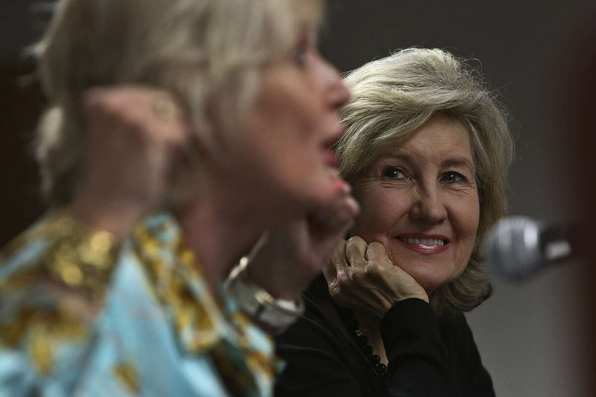 Former U.S. Sen. Kay Bailey Hutchison (right) watches moderator, District Attorney Susan Reed talk after Hutchison read from and answered questions about her new book “Unflinching Courage: Pioneering Women Who Shaped Texas.”