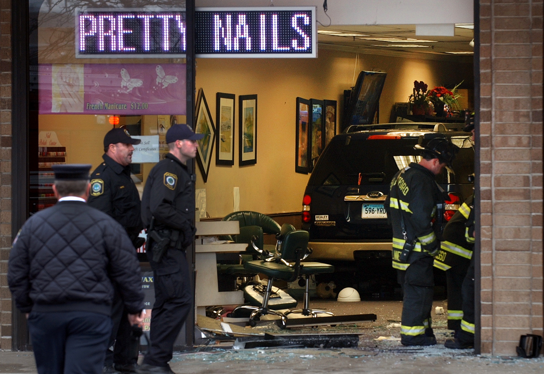 Driver charged in nail salon crash