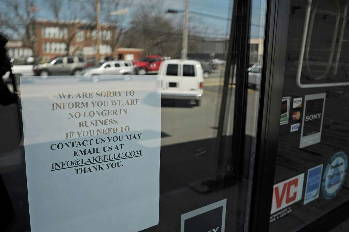 A sign on the front door at Lake Electronics store on Central Ave. on Monday, April 15, 2013 in Colonie, NY. The store has recently closed. (Paul Buckowski / Times Union)