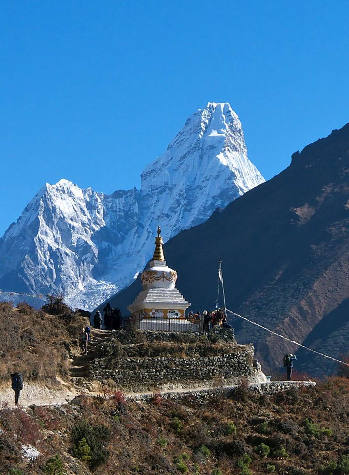 A chorten echoes the stunning shape of Ama Dablam, considered by many to be the most beautiful peak in the Himalayas.