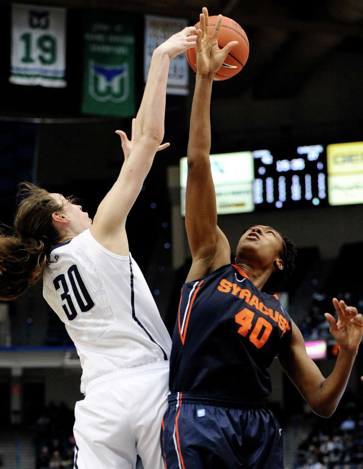 Connecticut's Breanna Stewart, left, and Syracuse's Kayla Alexander fight for a rebound in the second half of an NCAA college basketball game in the semifinals of the Big East Conference women's tournament in Hartford, Conn., Monday, March 11, 2013. (AP Photo/Jessica Hill)