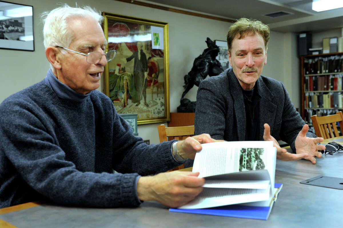 Herb Janick, left, and Bill Devlin talk about the new history book about Danbury, Conn., that they have recently published, Tuesday, April 16, 2013.