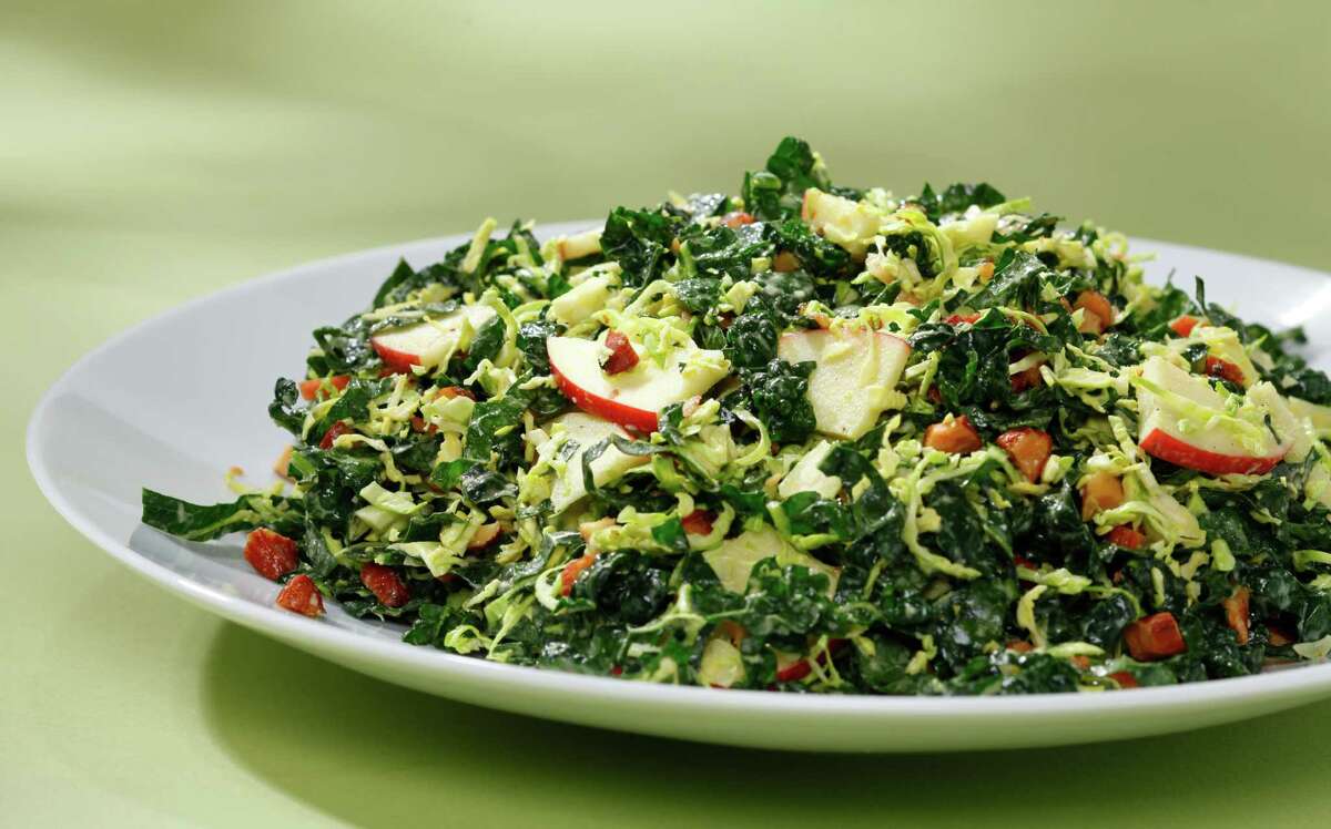 Kale & Brussels Sprout Salad With Toasted Almonds, Apples & LemonTahini Vinaigrette