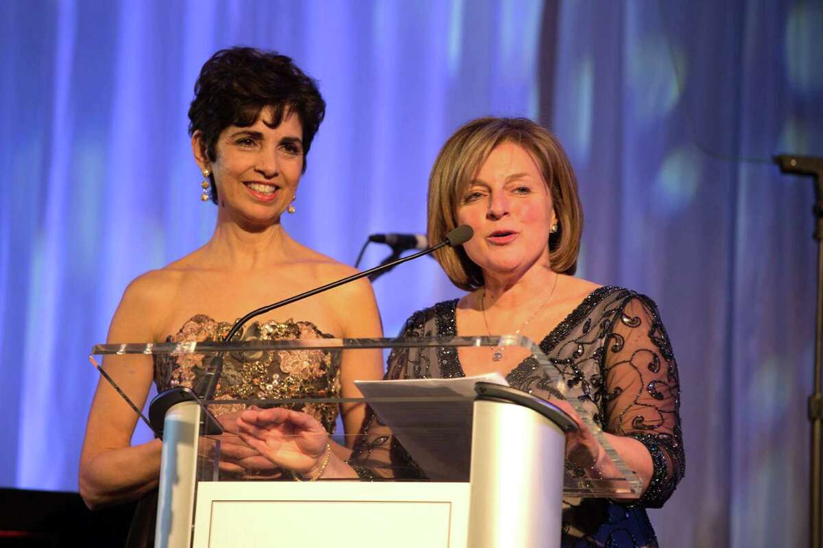 Co-Founders and co-presidents of Lyme Research Alliance Diane Blanchard (left) and Debbie Siciliano, both of Greenwich, welcome guests to the recent "Time for Lyme" gala, which raised more than $1 million to fund research.