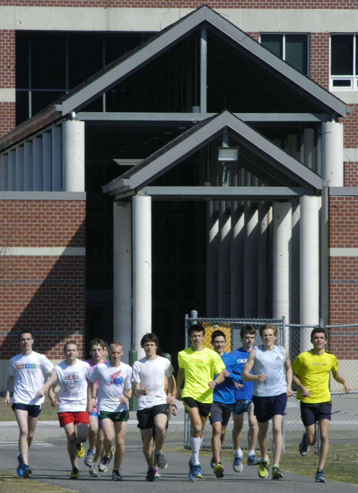 The Green Wave's experienced and talented distance corps preps for the New Milford HIgh School boys' track season, April 2013