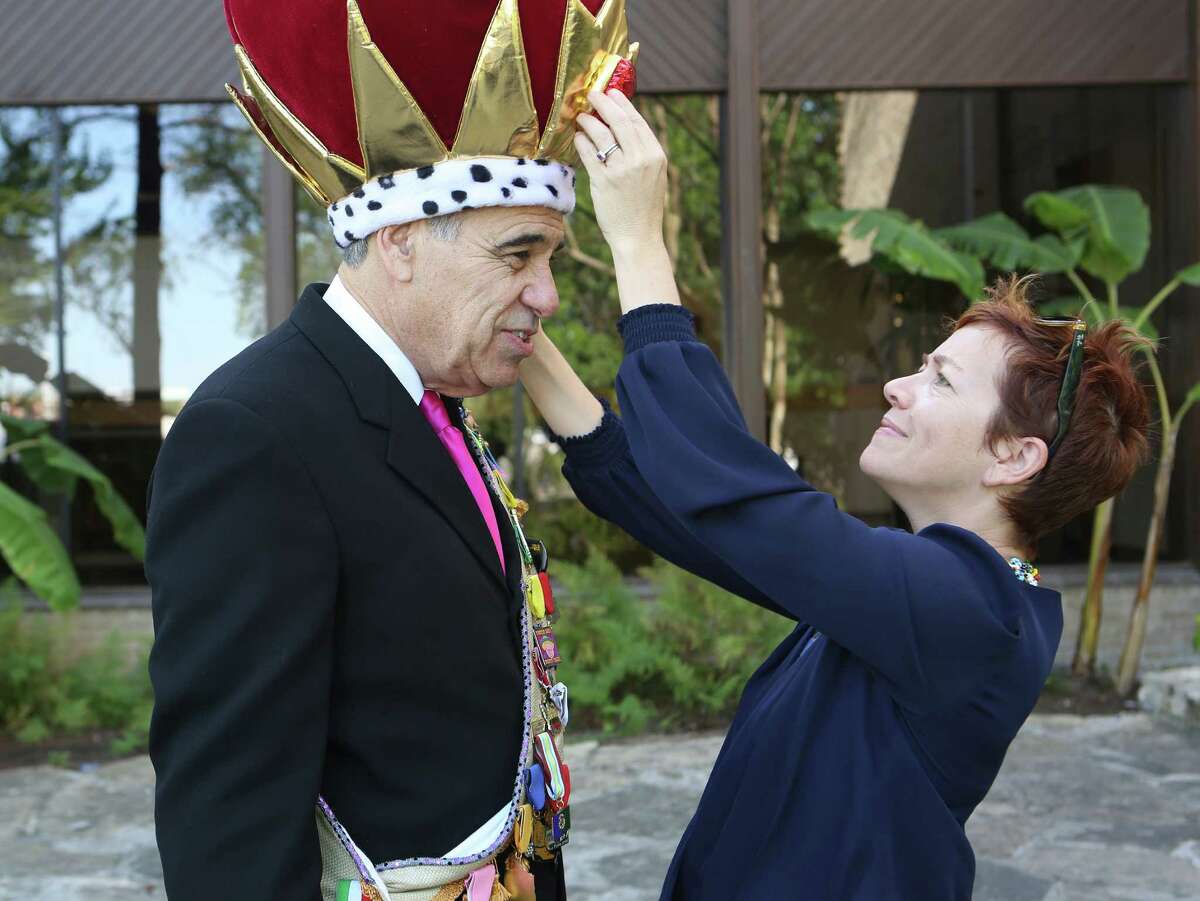 Charlie Gonzalez -- former congressman and current VIA bigwig -- is King Anchovy for Cornyation this year. Elain Wolff of PlazaDeArmas helps Gonzalez with a crown that he will wear to various events before Cornyation.