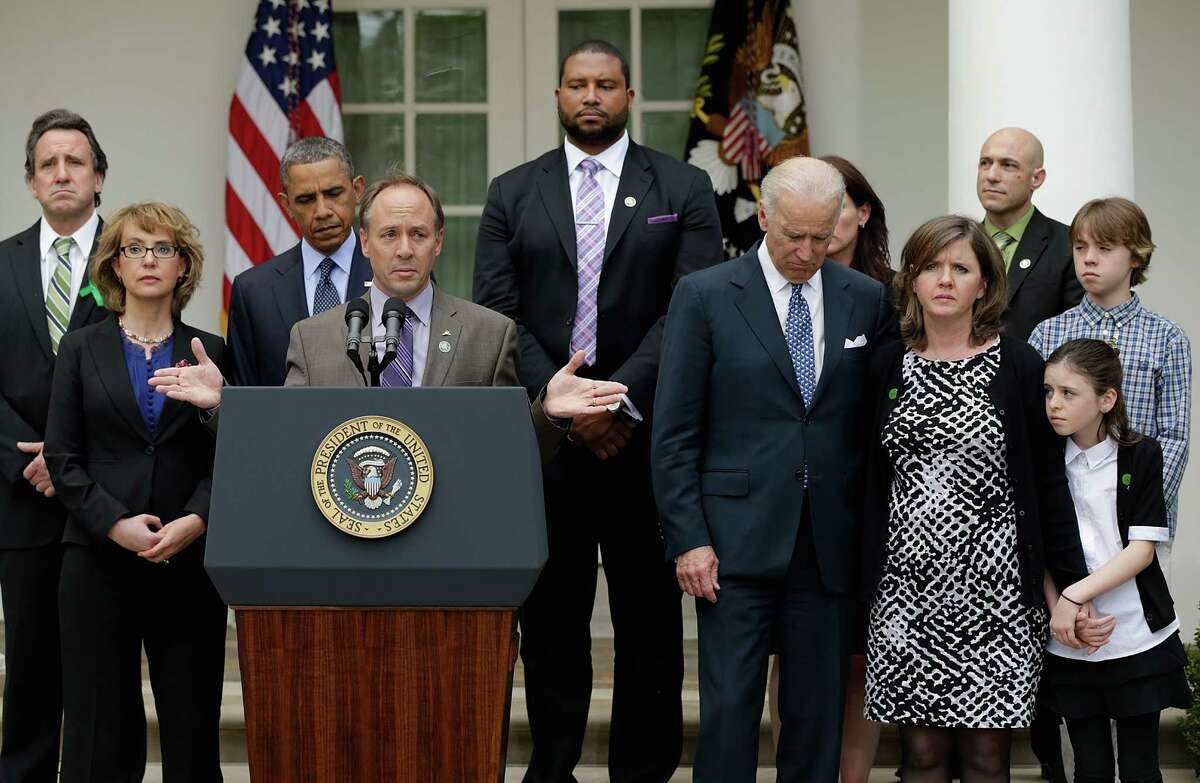 Mark Barden, the father of a victim at Sandy Hook Elementary School, joins U.S. President Barack Obama and Vice President Joe Biden in making a statement on gun violence in the Rose Garden of the White House on April 17, 2013 in Washington, DC. Earlier today the Senate defeated a bi-partisan measure to expand background checks for gun sales. Also pictured are family members of gun violence victims, and victims of gun violence, Gabby Giffords, Jimmy Greene, Nicole Hockley, Jeremy Richman, Neil Heslin, Jackie Barden, Natalie Barden and James Barden.