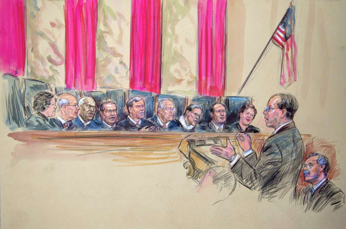 This artist rendering shows Paul Clement, second from left, with Solicitor General Donald B. Verrilli Jr. seated, right, addresses the Supreme Court in Washington, Wednesday, March 27, 2013, as the court heard arguments on the Defense of Marriage Act (DOMA) case. Justices, from left are, Sonia Sotomayor, Stephen Breyer, Clarence Thomas, Antonin Scalia, Chief Justice John Roberts, and Justices Anthony Kennedy, Ruth Bader Ginsburg, Samuel Alito and Elena Kagan. (AP Photo/Dana Verkouteren)