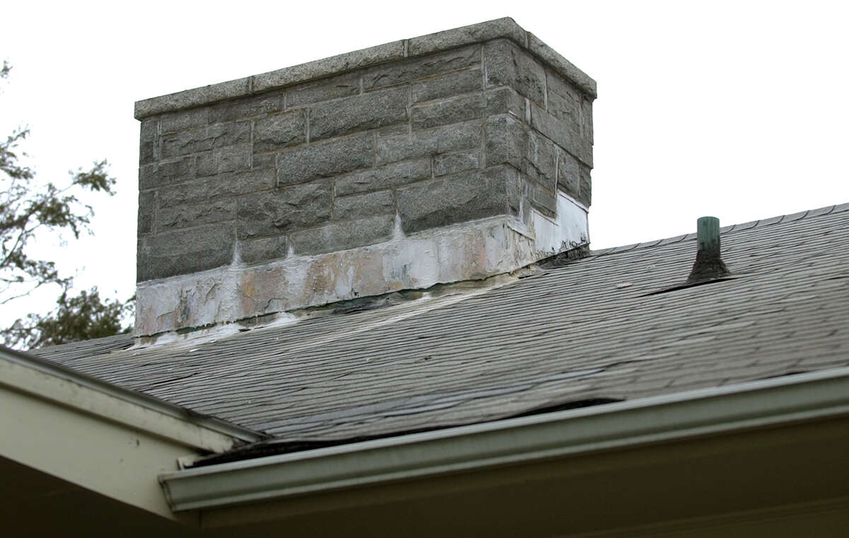 A view of the weathered roof on owner Steven Gaynes home on Brooklawn Avenue in Fairfield, Conn. on Thursday April 18, 2013. He has been struggling to sell his home because of issues from the inspections, such as the need for a new roof.