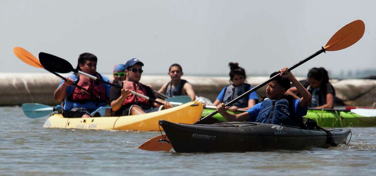 Kayak tour introduces teenagers to Galveston marshes