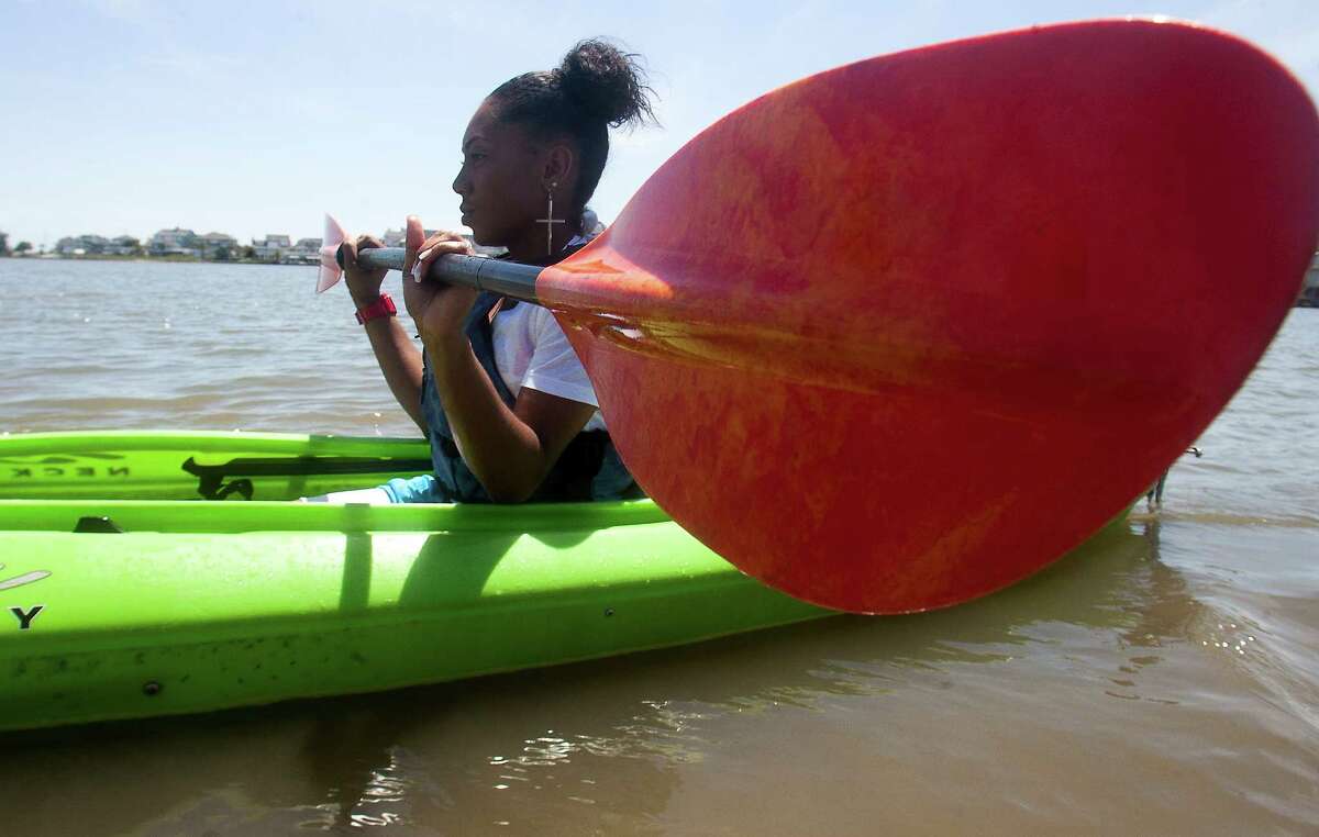 Kayak tour introduces teenagers to Galveston marshes
