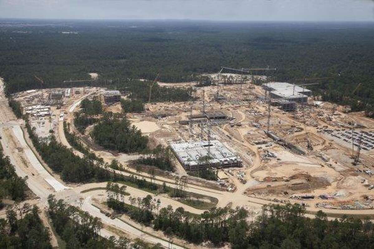 Summer 2012: These aerial photographs show the progress on Exxon Mobil’s huge corporate campus south of The Woodlands. The 385-acre development is west of Interstate 45 near the Hardy Toll Road. It’s being built to house at least 10,000 people and completion is schedueld for 2015 . An early estimate pegged the construction cost at more than $1.2 billion.