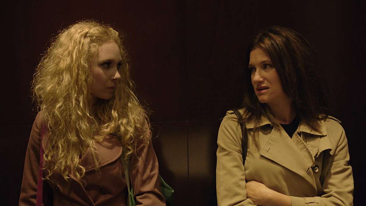 A scene from Jill Soloway's AFTERNOON DELIGHT, playing at the 56th San Francisco International Film Festival, April 25 - May 9, 2013. From left: Juno Temple and Kathryn Hahn.