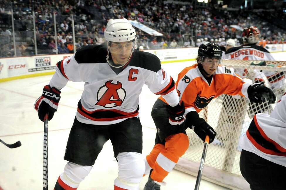 Albany Devils? Jay Leach defends against the Adirondack Phantoms in the third period, Sunday evening April 21, 2013, at the Times Union Center in Albany, N.Y. (Will Waldron/Times Union)