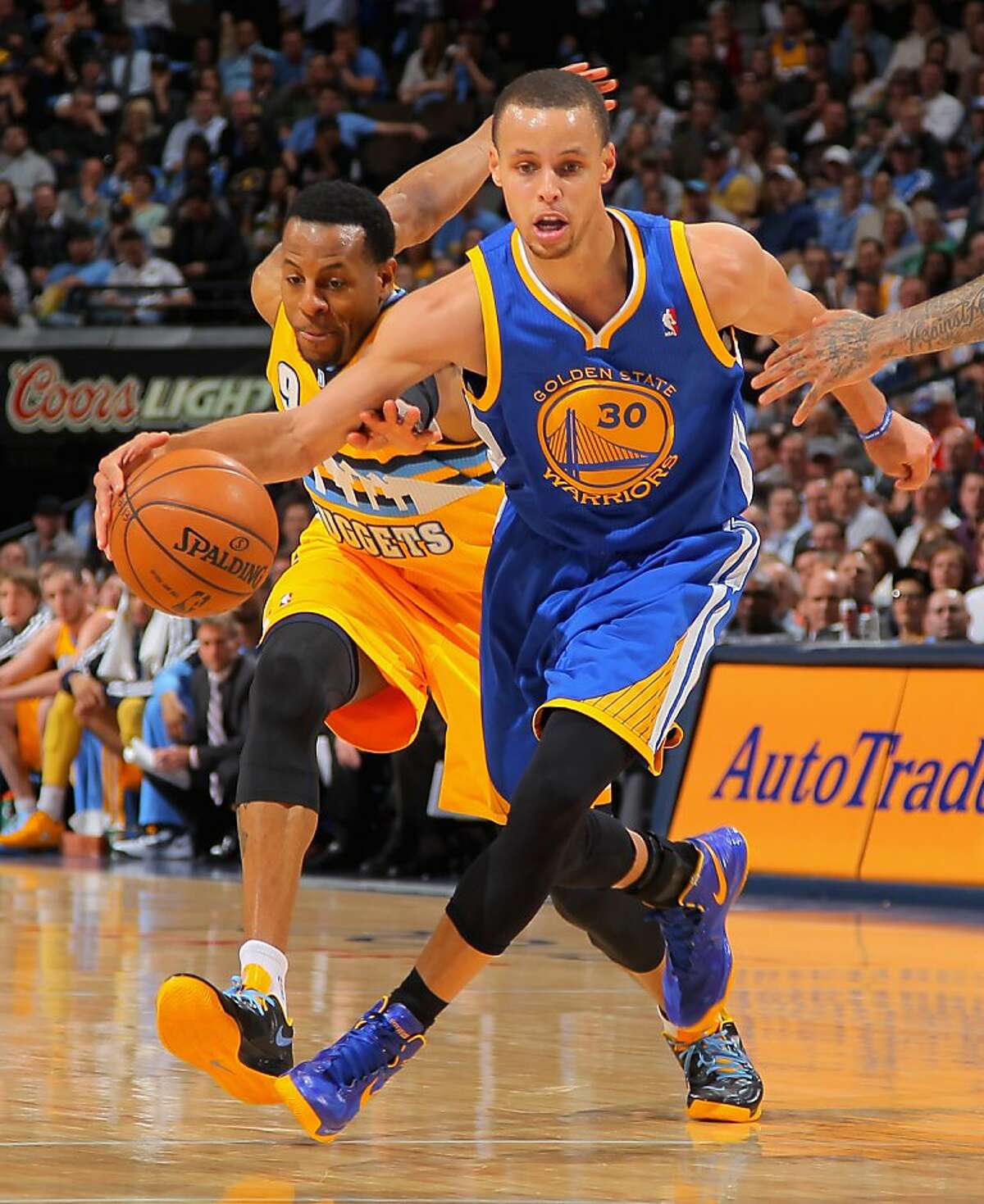 Warriors on target, win 131-117 at Denver