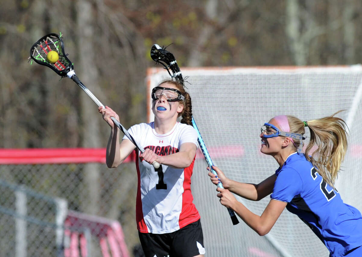 Darien girls lacrosse upends New Canaan in FCIAC showdown