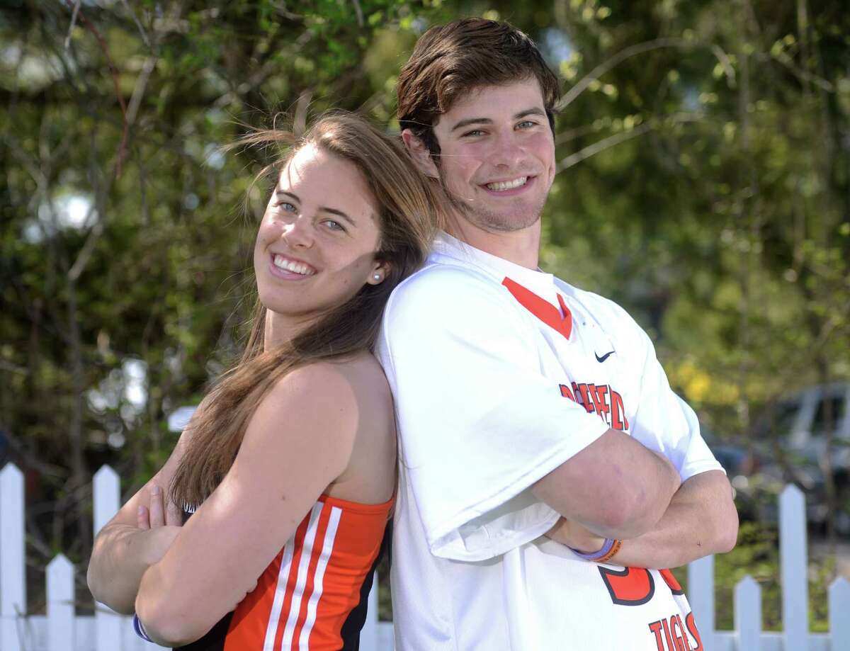Ridgefield seniors Ellie and Sam Gravitte pose at their home in Ridgefield, Conn. on Friday, April 26, 2013. The twins are star athletes at their school, with Ellie throwing javelin and Sam playing lacrosse and football.