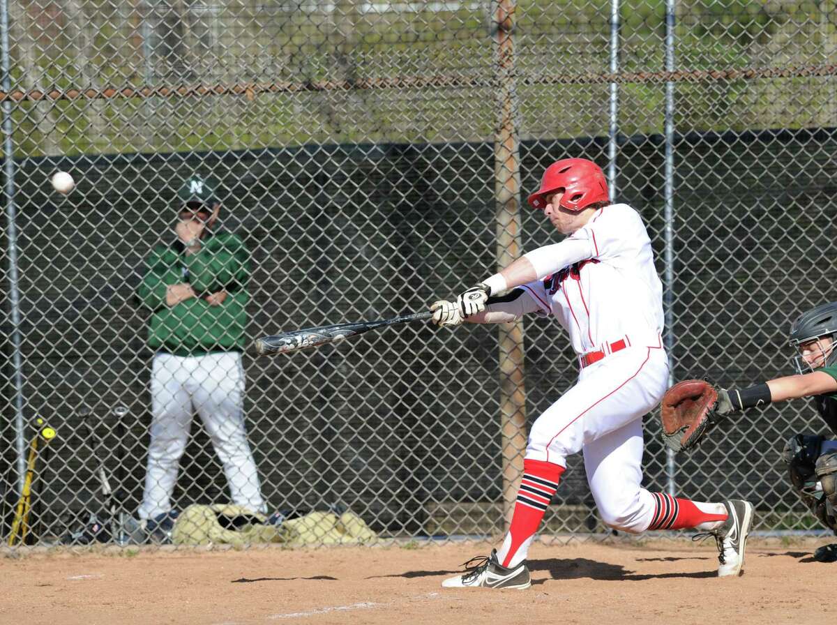 Taylor Olmstead of Greenwich belts a first-pitch three run homer in the bottom of the second inning of the high school baseball game between Greenwich High School and Norwalk High School at Greenwich, Friday afternoon, April 26, 2013.