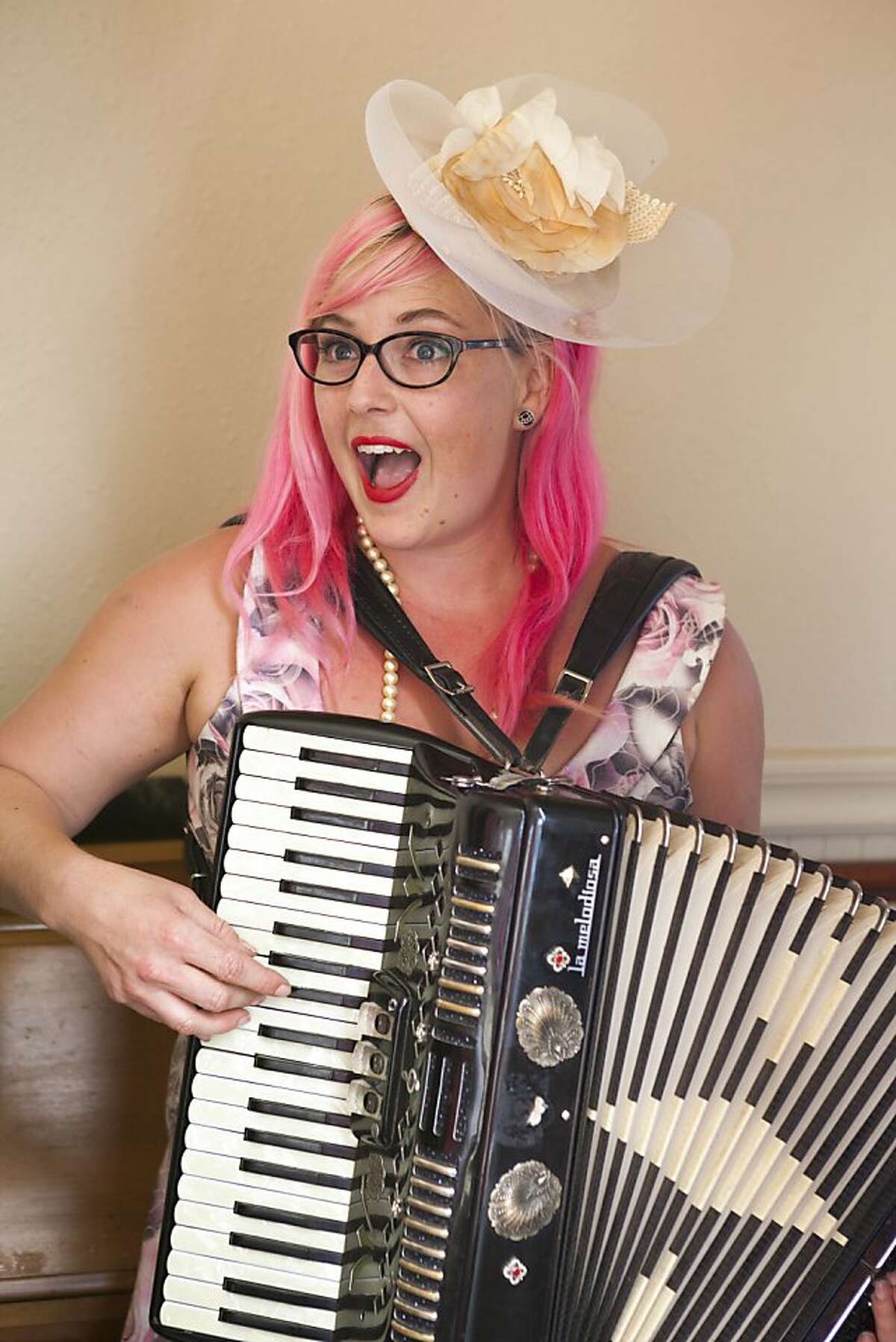 Rachael Devlin and her trusty accordian are a fixture at the Jerk Church. Photographed in Oakland, CA on Sunday, April 21, 2013.