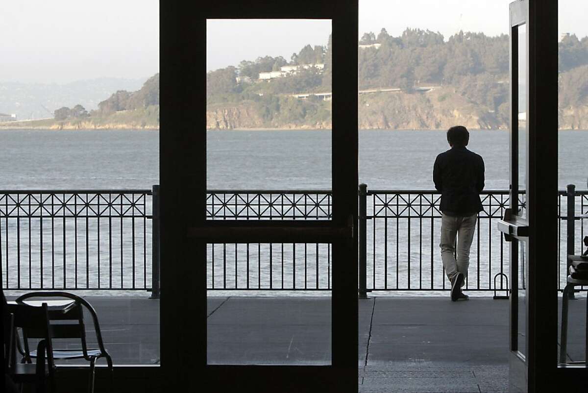 A man looks out at the bay at the San Francisco Ferry Building on April 26, 2013 in San Francisco, Calif. The Port of San Francisco is celebrating 150 years.