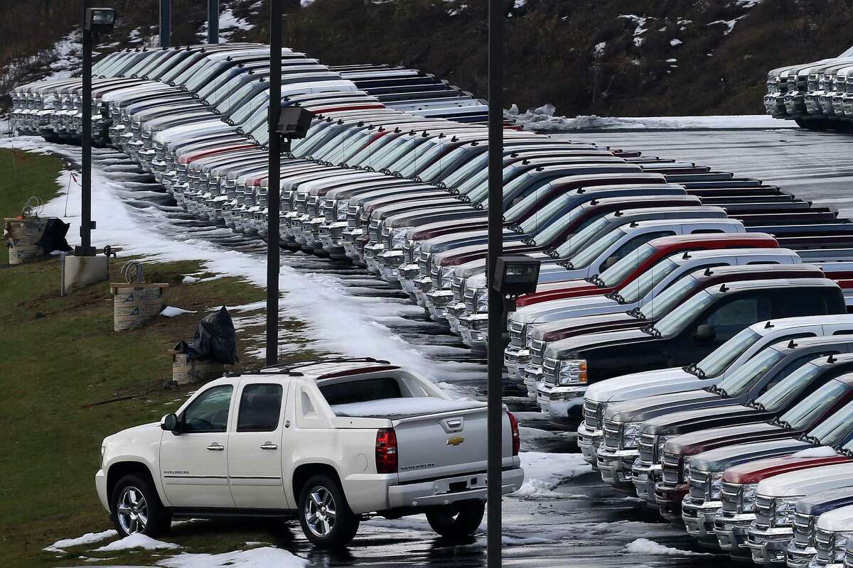 Chevy trucks line the lot of a dealer in Murrysville, Pa. Auto lease experts say it's important to pay attention to the beginning, middle and end-of-lease costs.