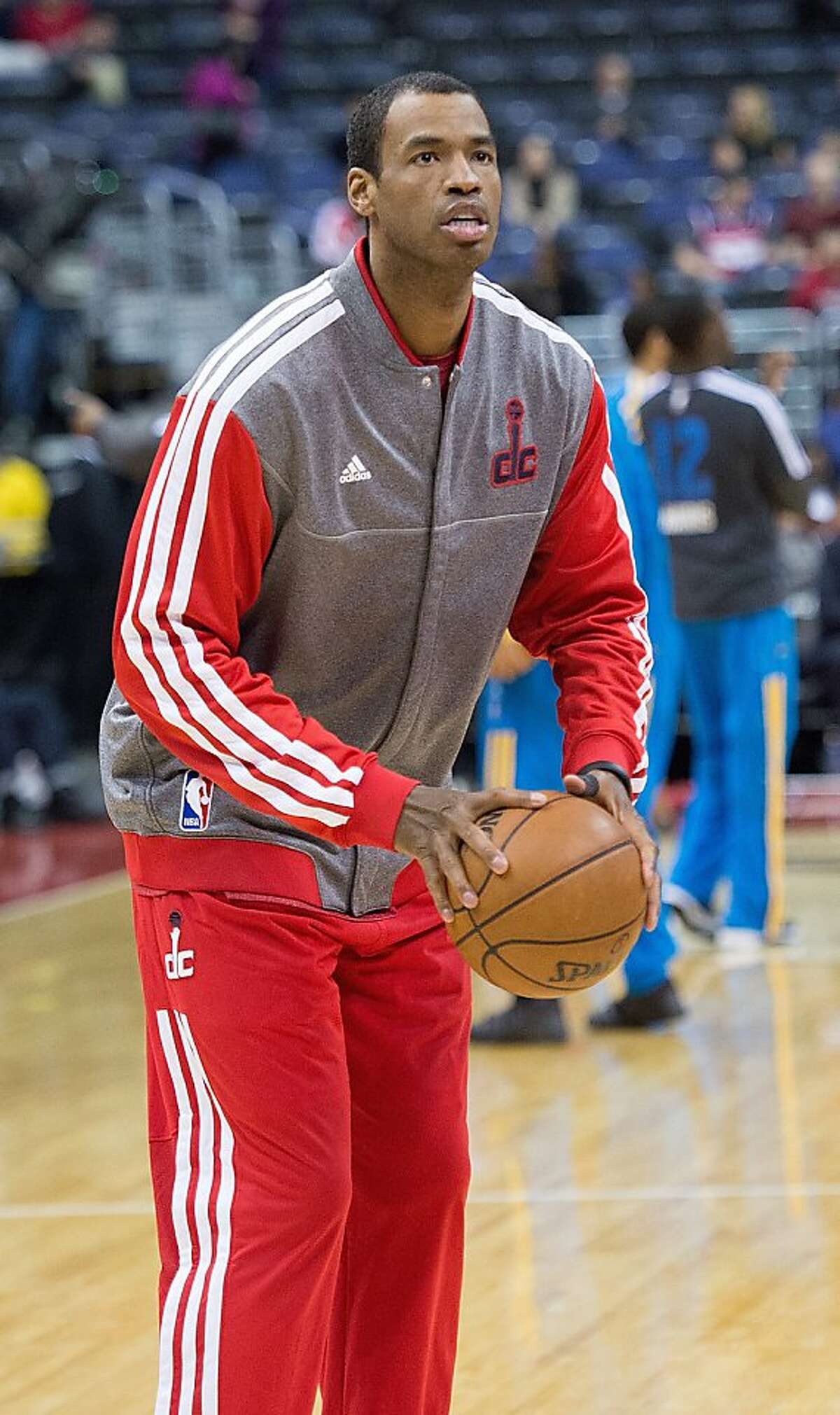 Washington Wizards center Jason Collins (98) warms up before their game against the New Orleans Hornets.