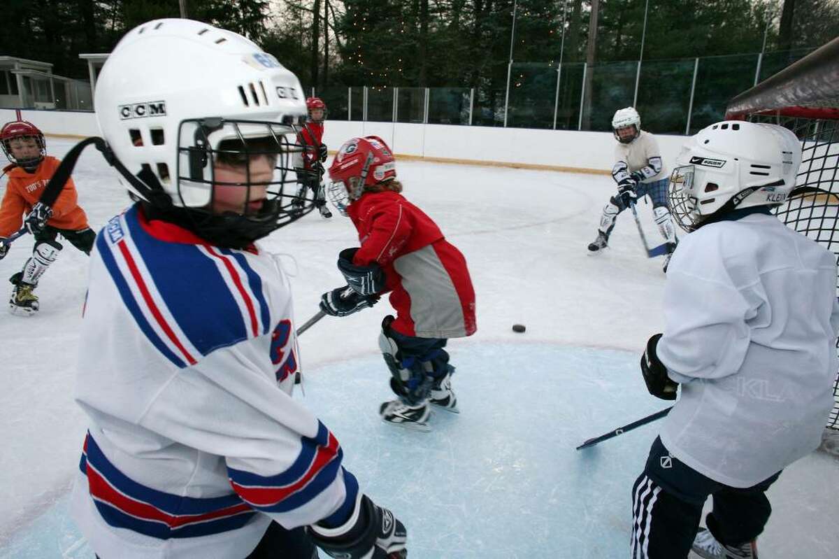 Former Ranger goalie Mike Richter takes game outside in kids camp