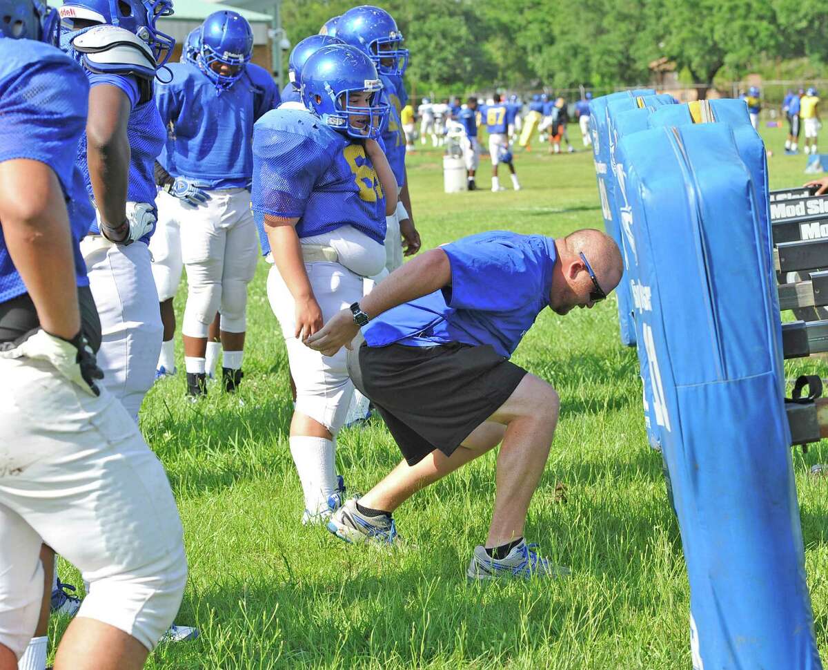 High school football spring practice begins