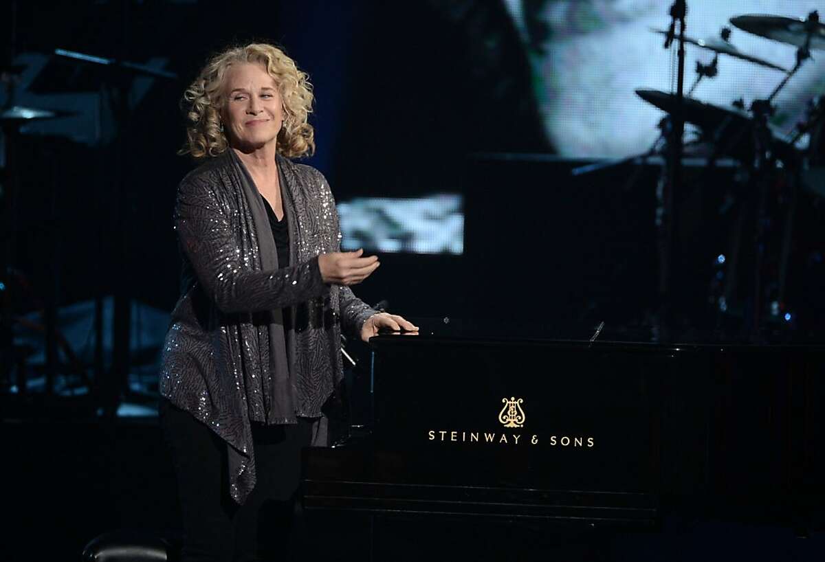 LOS ANGELES, CA - APRIL 18: Singer Carole King performs onstage at the 28th Annual Rock and Roll Hall of Fame Induction Ceremony at Nokia Theatre L.A. Live on April 18, 2013 in Los Angeles, California. (Photo by Kevin Winter/Getty Images)
