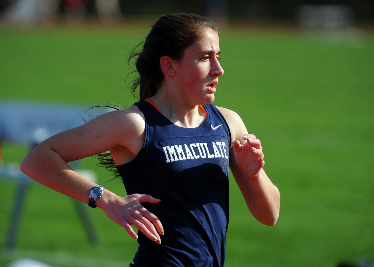 Immaculate's Jessica Wojnicki competes in the 1600 meter race, during track action at Barlow high in Redding, Conn. on Tuesday April 30, 2013.