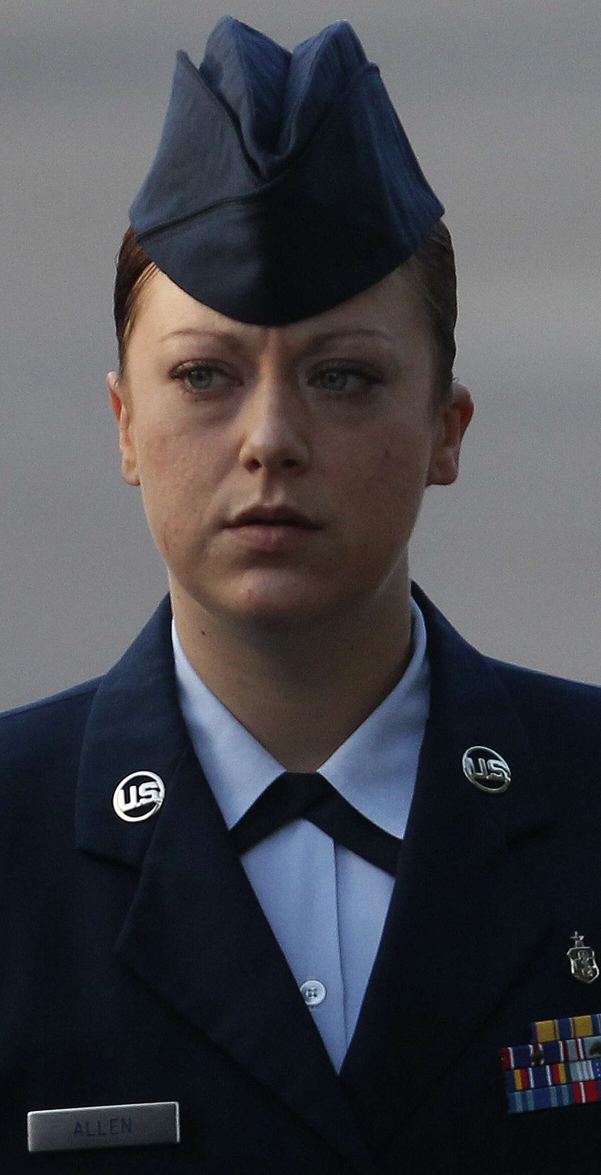 U.S. Air Force Staff Sergeant Emily Allen walks to a hearing Wednesday May 1, 2013 at Joint Base San Antonio-Lackland. Allen is the first woman basic training instructor charged in the scandal at Joint Base San Antonio-Lackland and is charged with having sex with a trainee.
