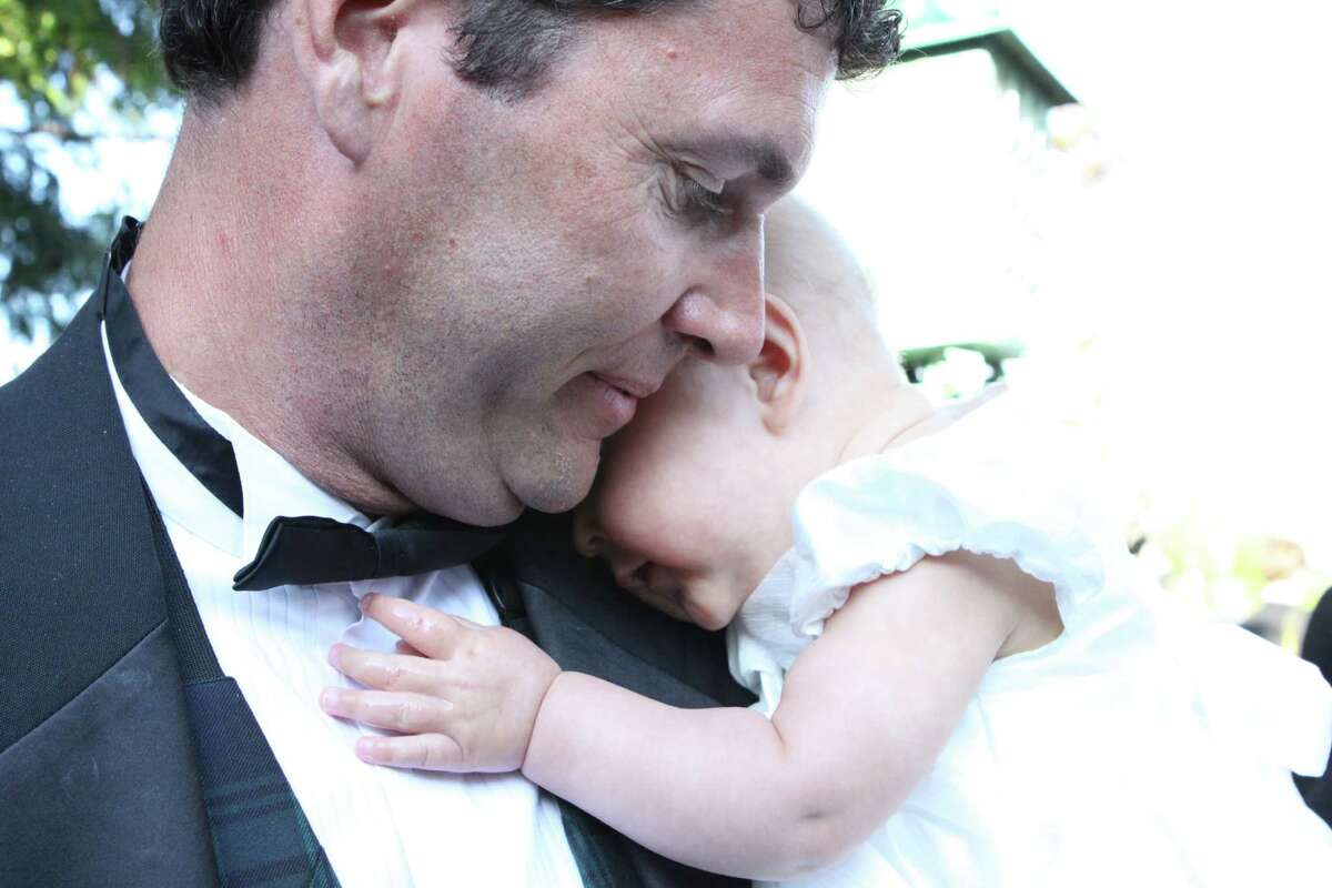 Paul Curtin and Quinn share a tender moment at the Father Daughter Ball.