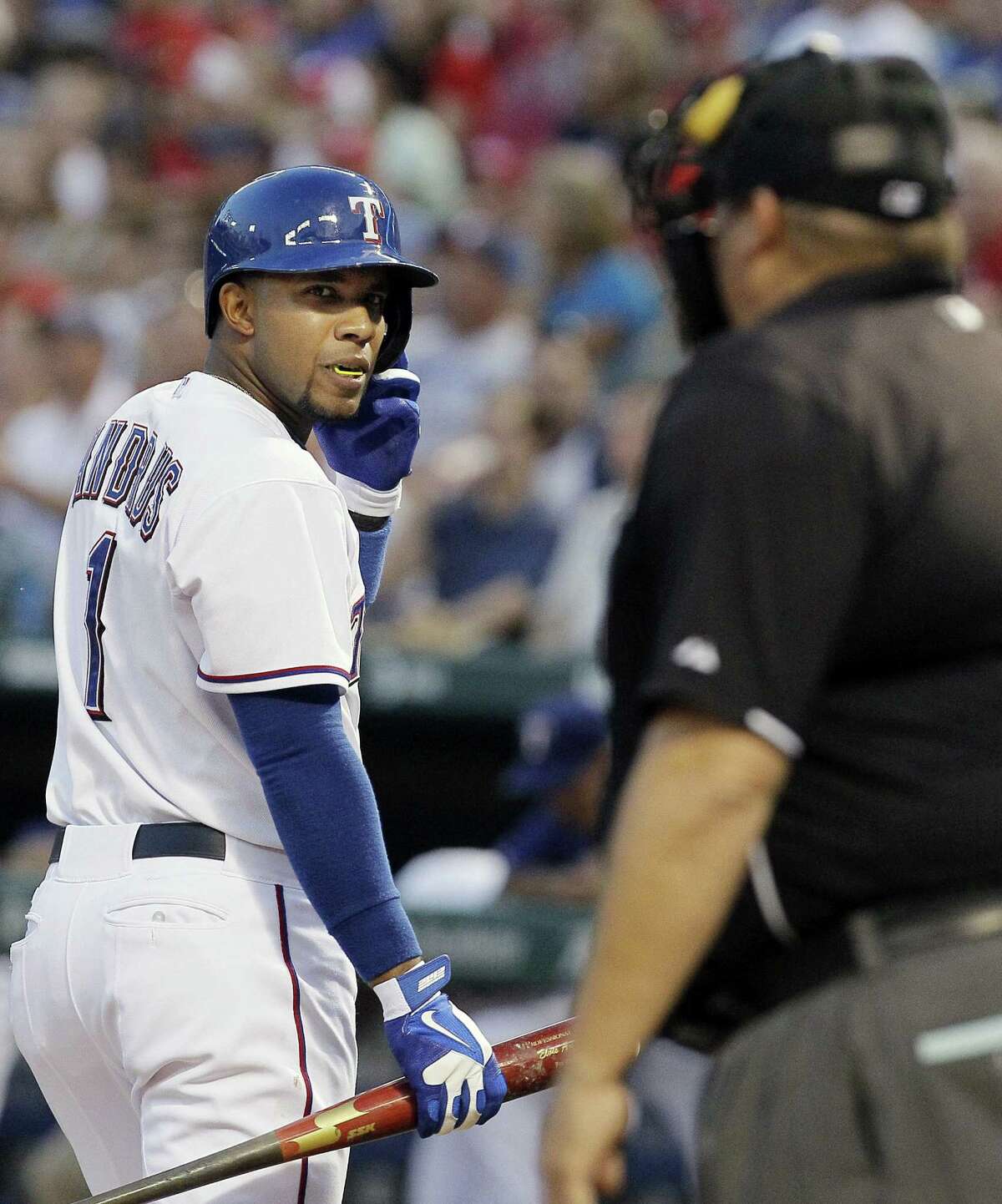 The Rangers' Elvis Andrus glances toward home plate umpire Fieldin Culbreth after striking out in the second inning.