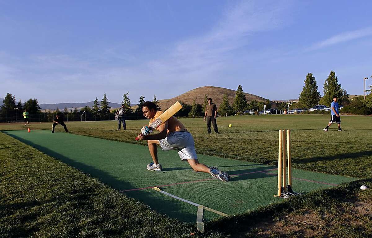 Simran Bedia cricket player for the Titans takes a swing during practice at Windemere MIddle School in San Ramon, Calif. on Tues. April 30, 2013. There are more than twenty teams competing in the San Ramon area cricket league.The exploding influx of Asian immigrants into California in recent years has created a new phenomenon up and down the state, the Asian suburb.