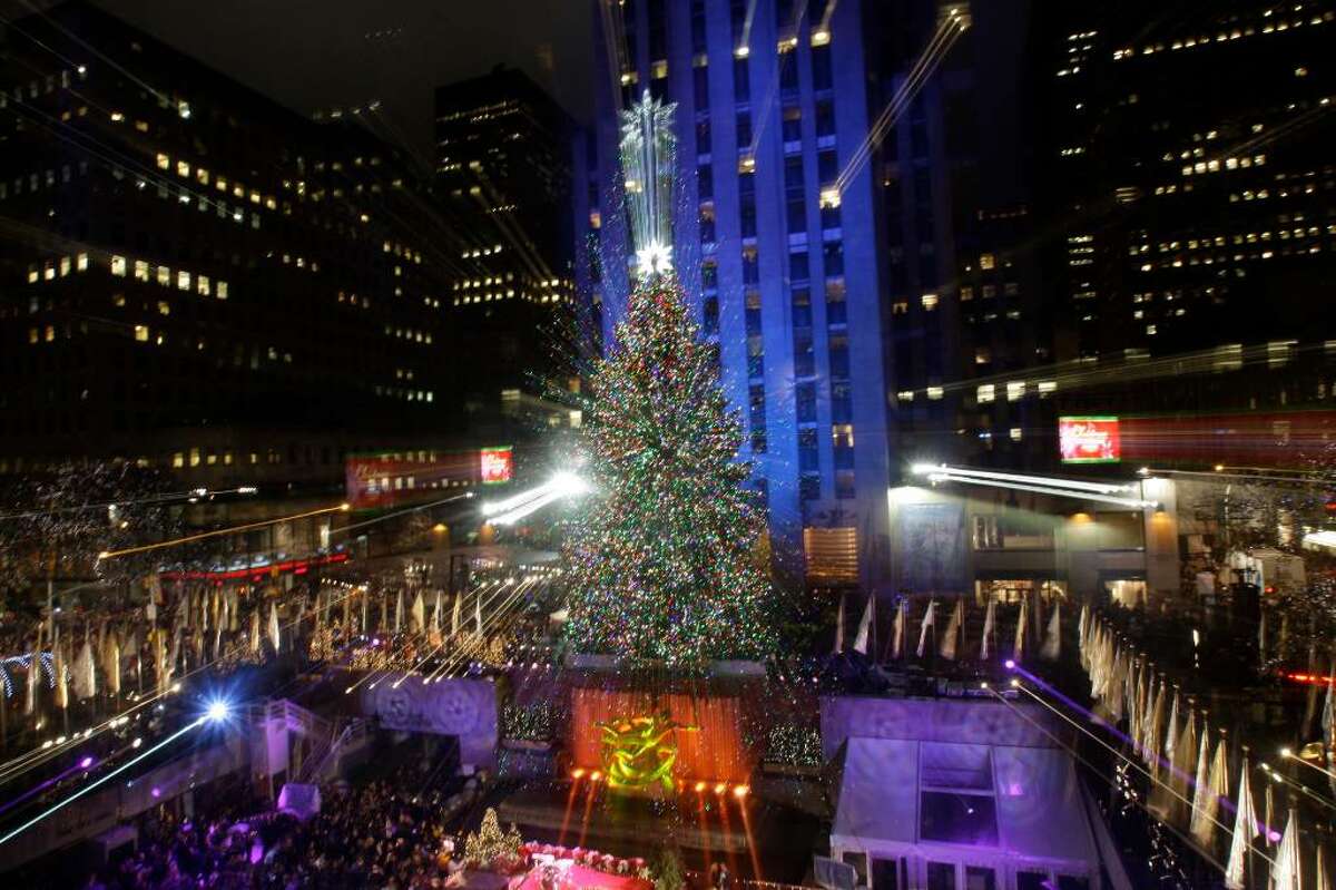 The Rockefeller Center Christmas Tree, which came from Easton CT, stands lit in front of the General Electric building in New York's Rockefeller Plaza during the 77th annual tree lighting ceremony Wednesday, Dec. 2, 2009 in New York. (AP Photo/Frank Franklin II)