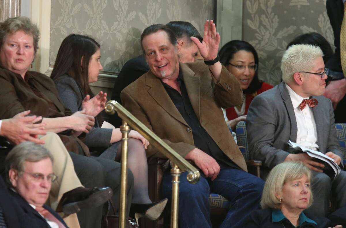 Musician and gun rights advocate Ted Nugent (C) attends U.S. President Barack Obama's State of the Union address before a joint session of Congress February 12, 2013 in Washington, DC. Rep. Steve Stockman (R-TX) invited Nugent as his guest for the President's speech.