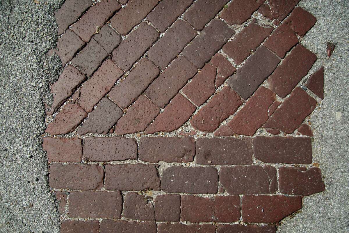 "Those brick streets are the defining element of Freedmen's Town. There's no more room for compromise. Everything else has been compromised away," says Catherine Roberts, a board member of the Rutherford B.H. Yates Museum.