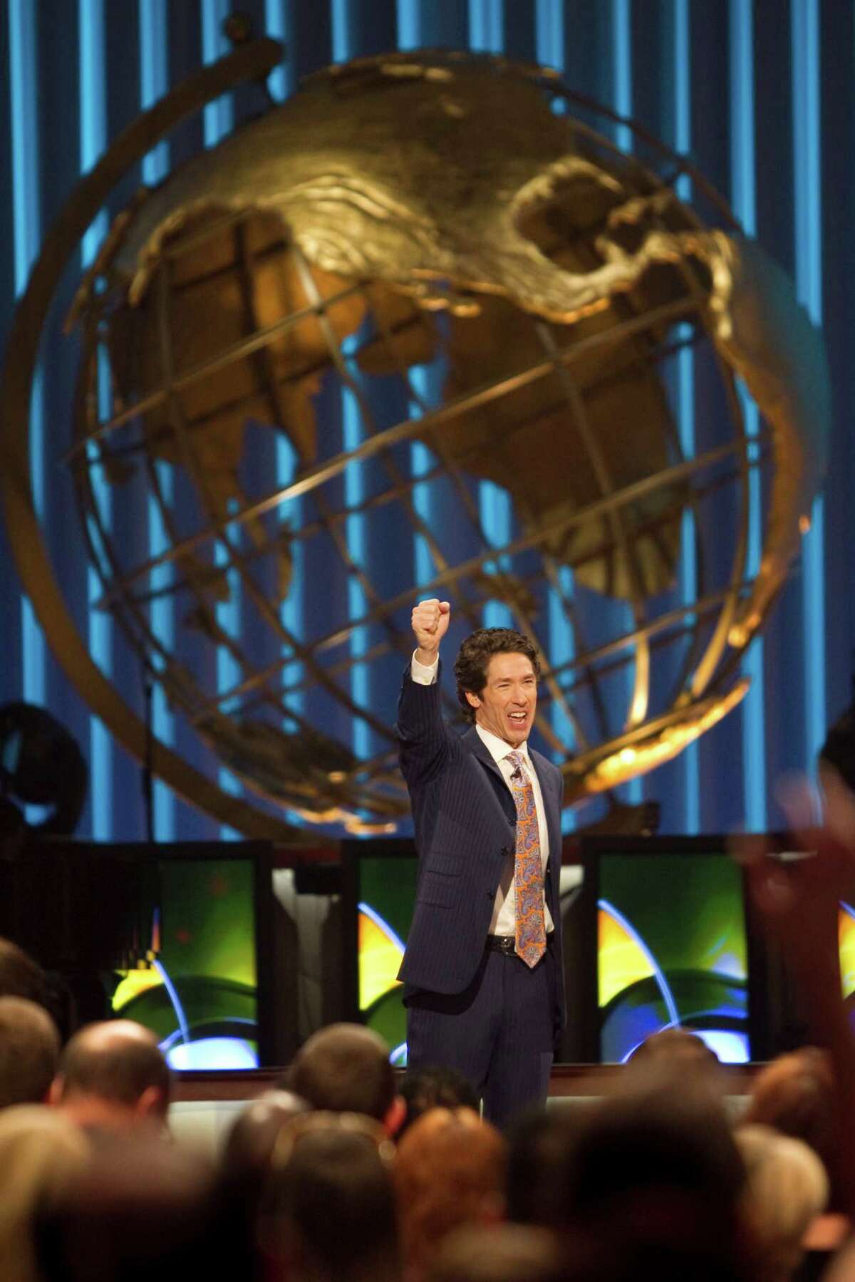 Lakewood Church Pastor Joel Osteen,welcoms his congregation to his 11 a.m. service, Sunday, Aug. 28, 2011, in Houston ( Nick de la Torre / Houston Chronicle )